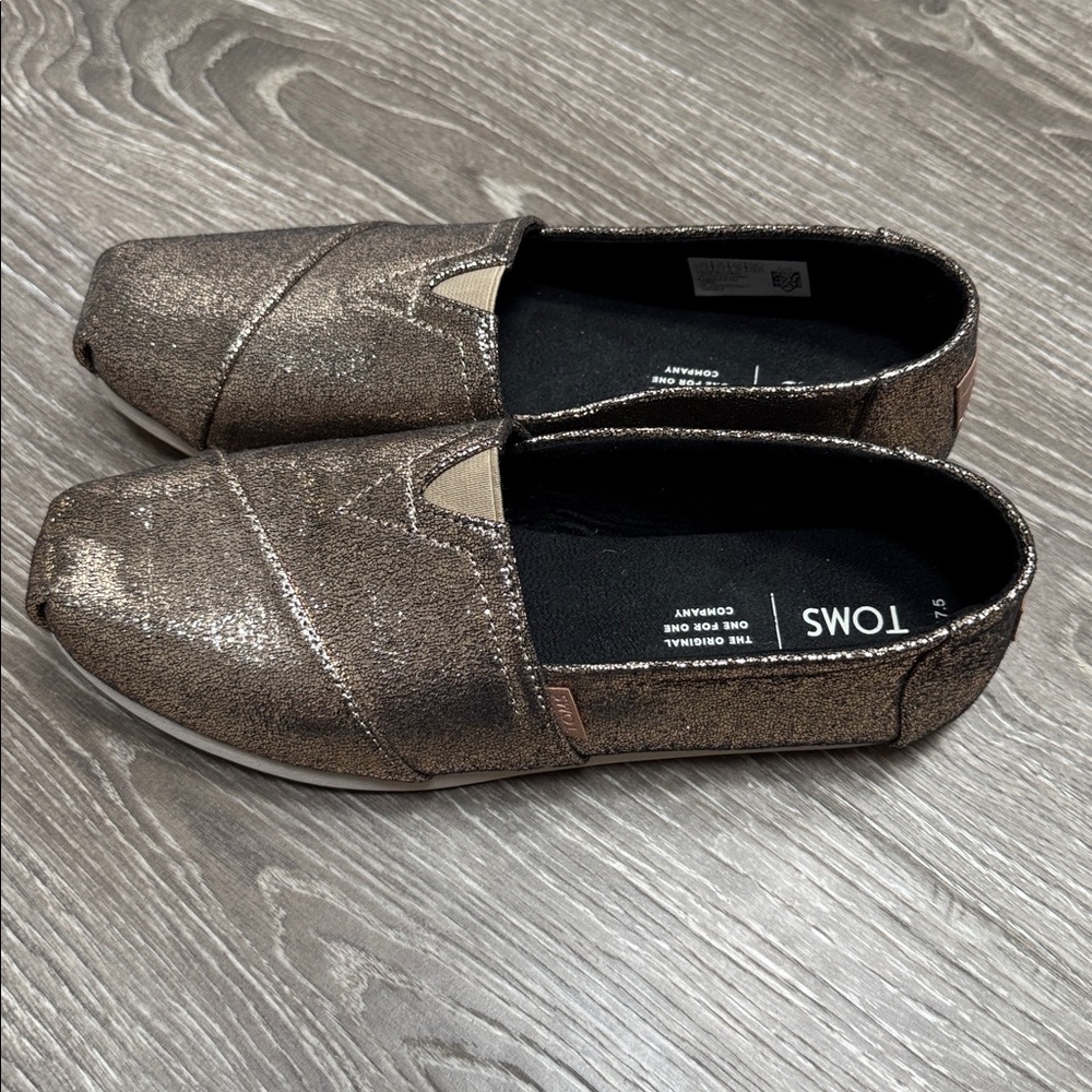 TOMS Shimmering Bronze Slip-Ons size 7.5 wmns